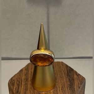 Ring with a beige stone